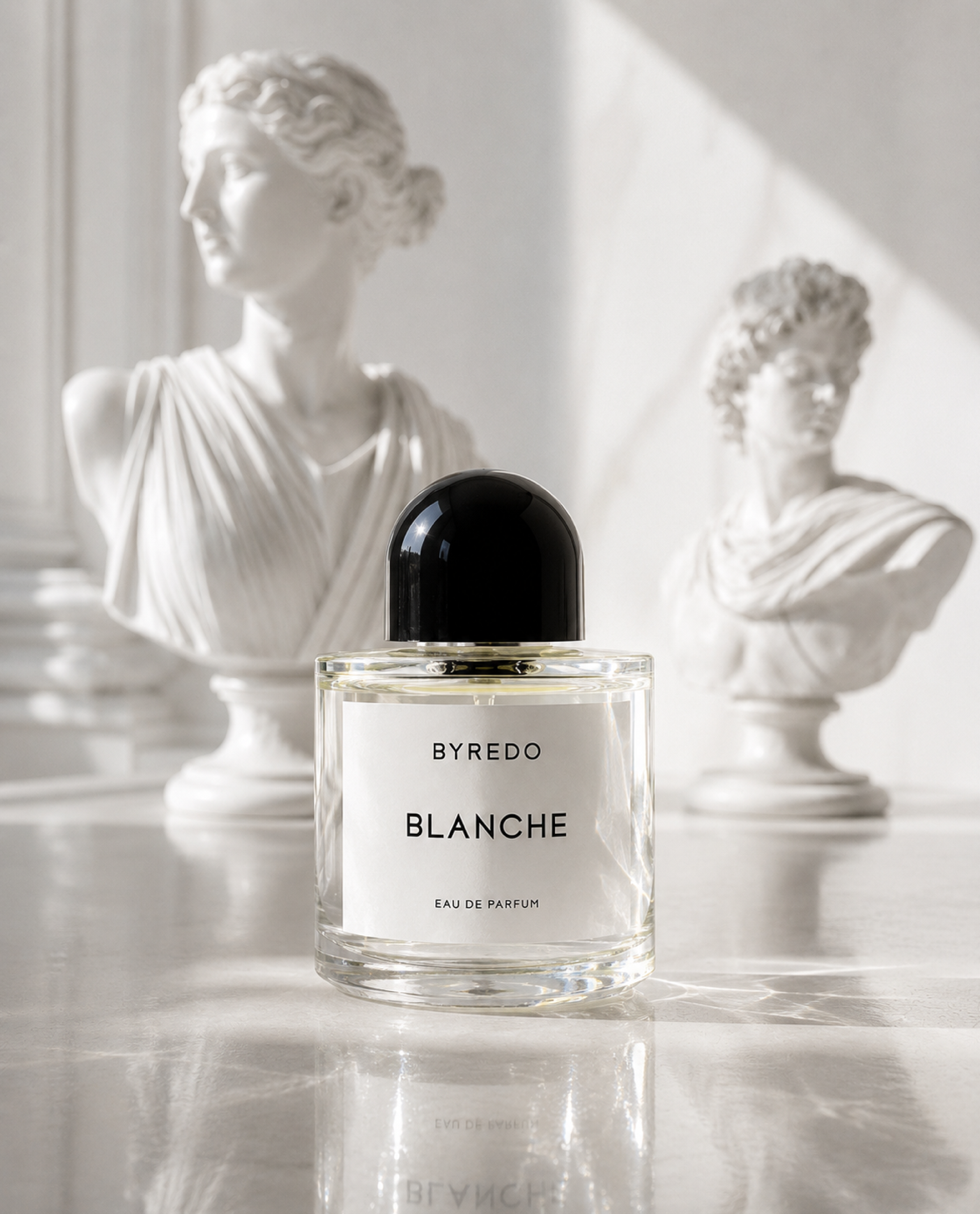 Luxury perfume atomizer on marble surface